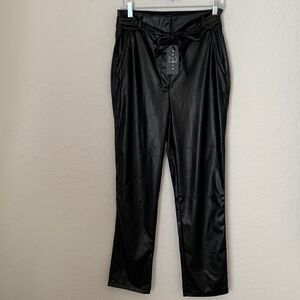 Saints vegan leather black belled woman’s pants. Size L.